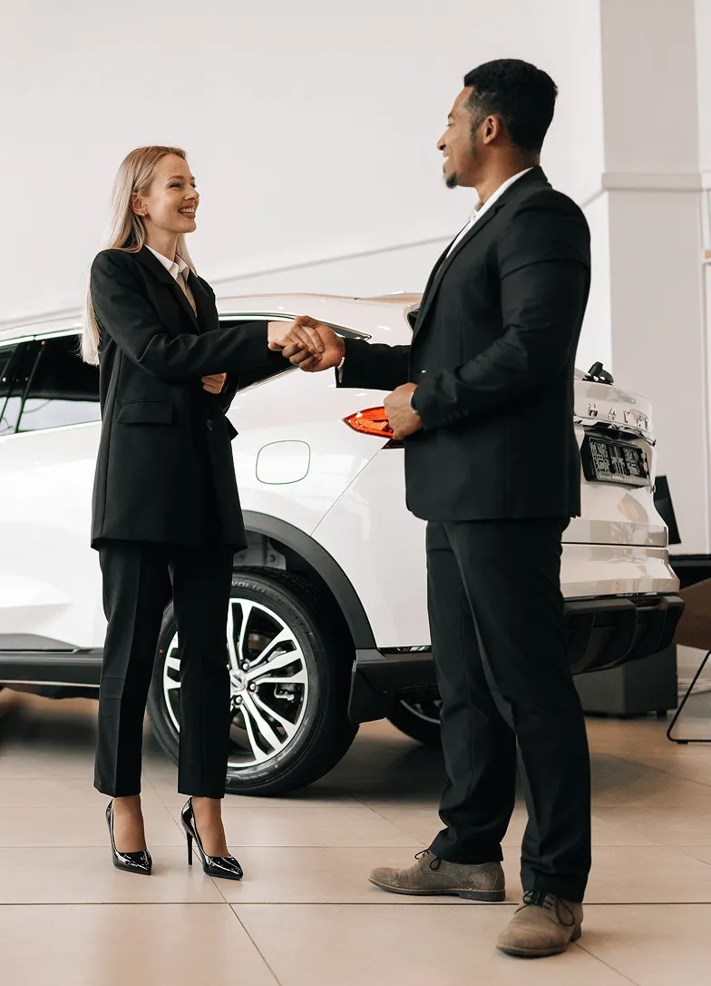 Image of a man and a woman shaking hands