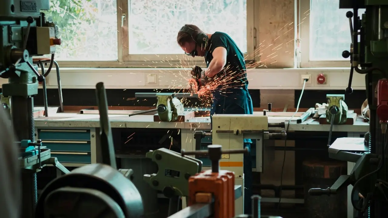 selective-focus-photography-of-man-using-angle-grinder