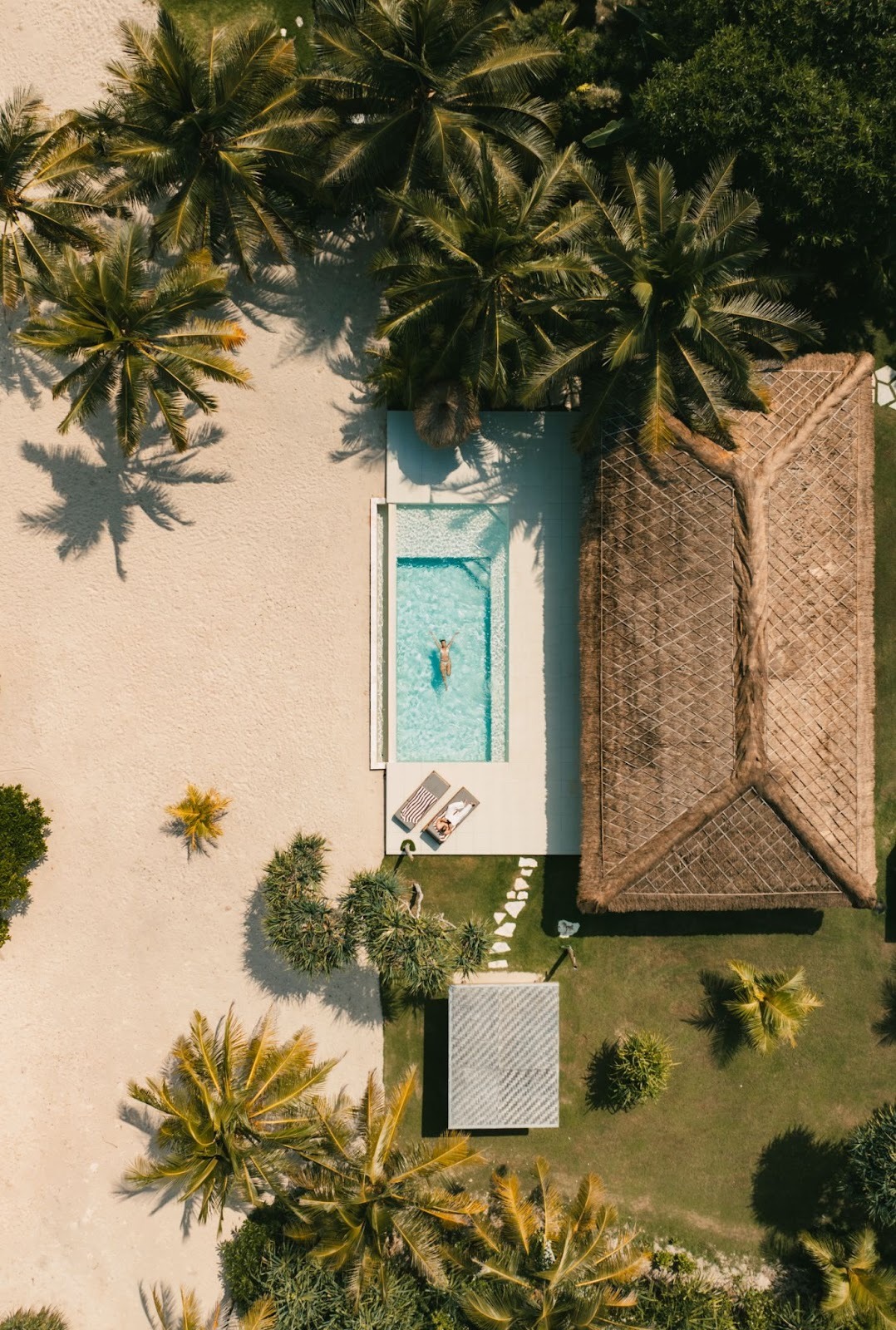 Beachfront villa at The Sanubari in West Sumba with a private pool and tropical sunset views.