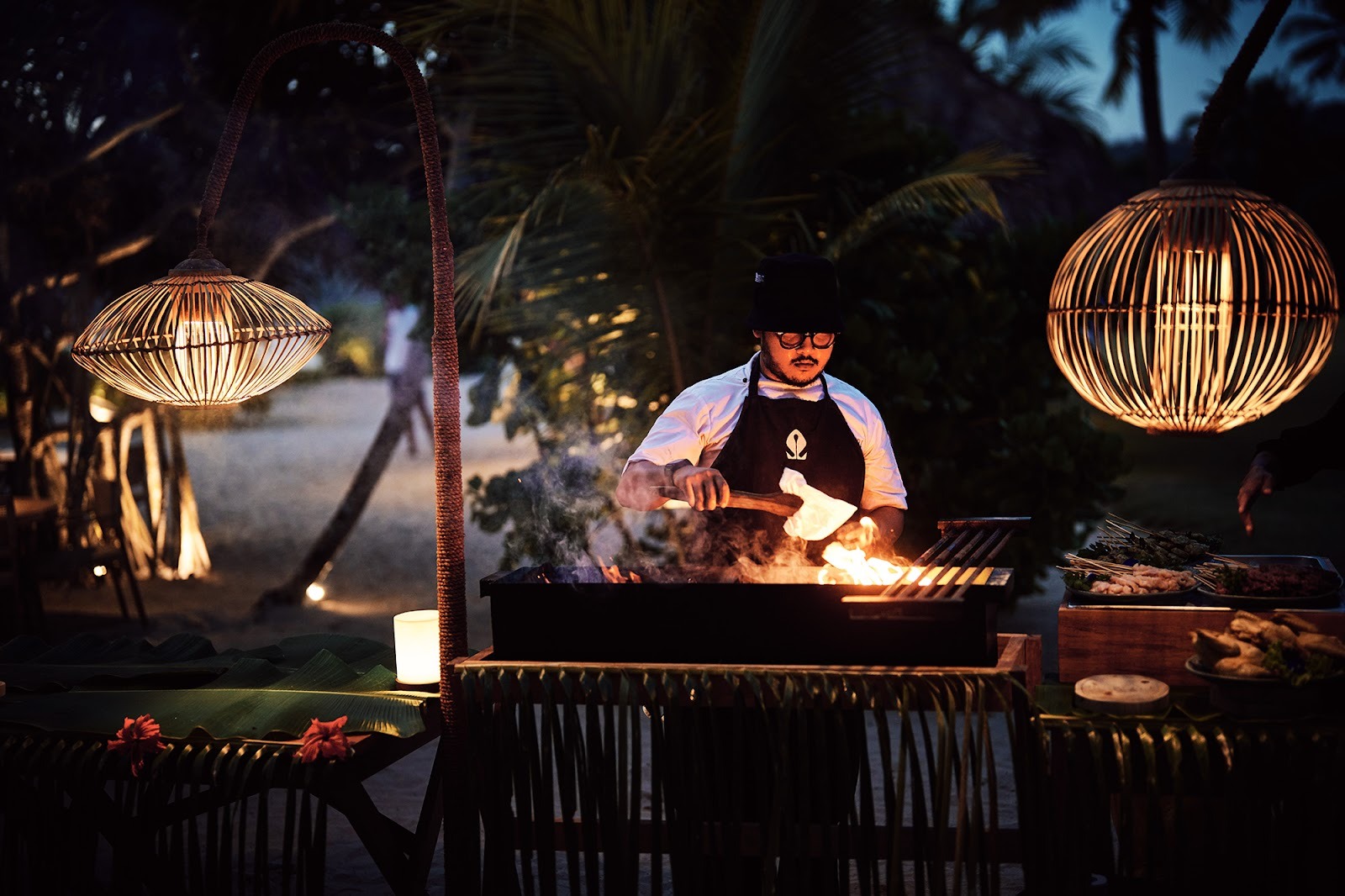 Evening open-fire dining experience at a sustainable Sumba resort supporting dry tourism and slow travel