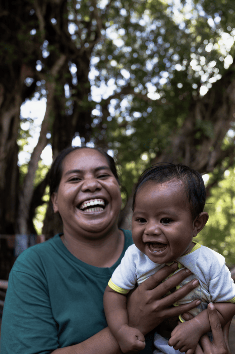 Local mother and child in West Sumba representing improved health and family wellbeing through access to clean water and community support