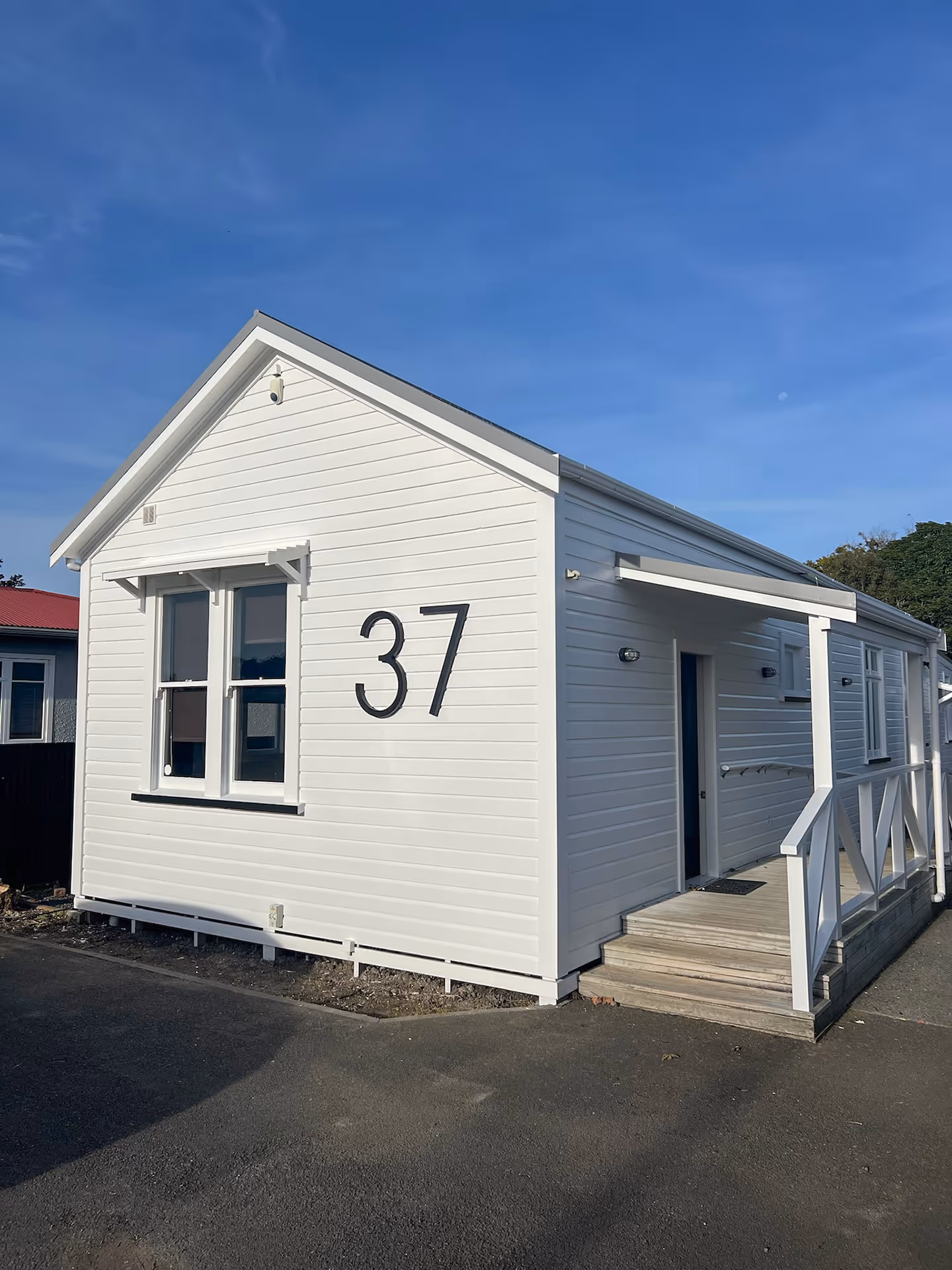 Freshly repainted weatherboard business completed by Rivercity Painting Ltd