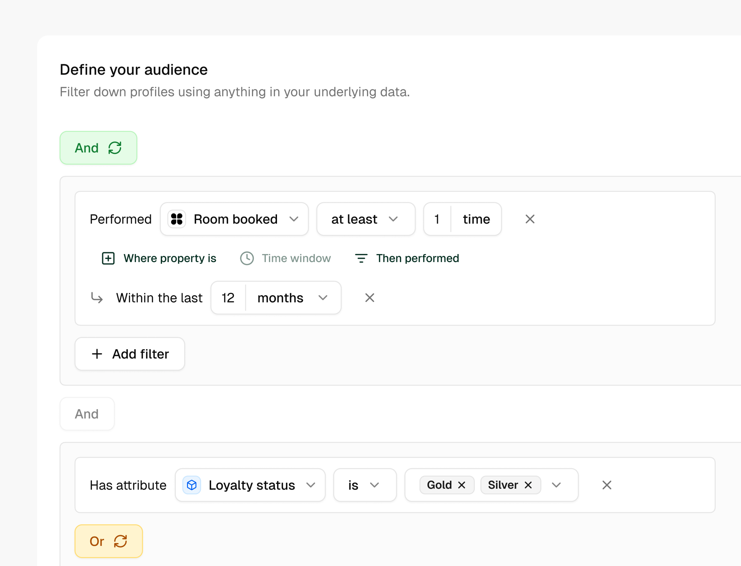 User interface screen showing options to define an audience with filters for 'Room booked' at least once within 12 months and loyalty status as Gold or Silver.