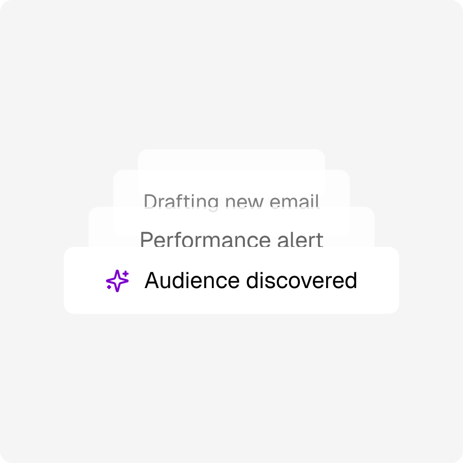 Stacked notification cards with the top card highlighting 'Audience discovered' accompanied by a purple sparkles icon.