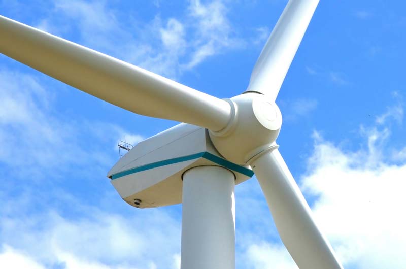 Wind Turbine against blue sky euroforest