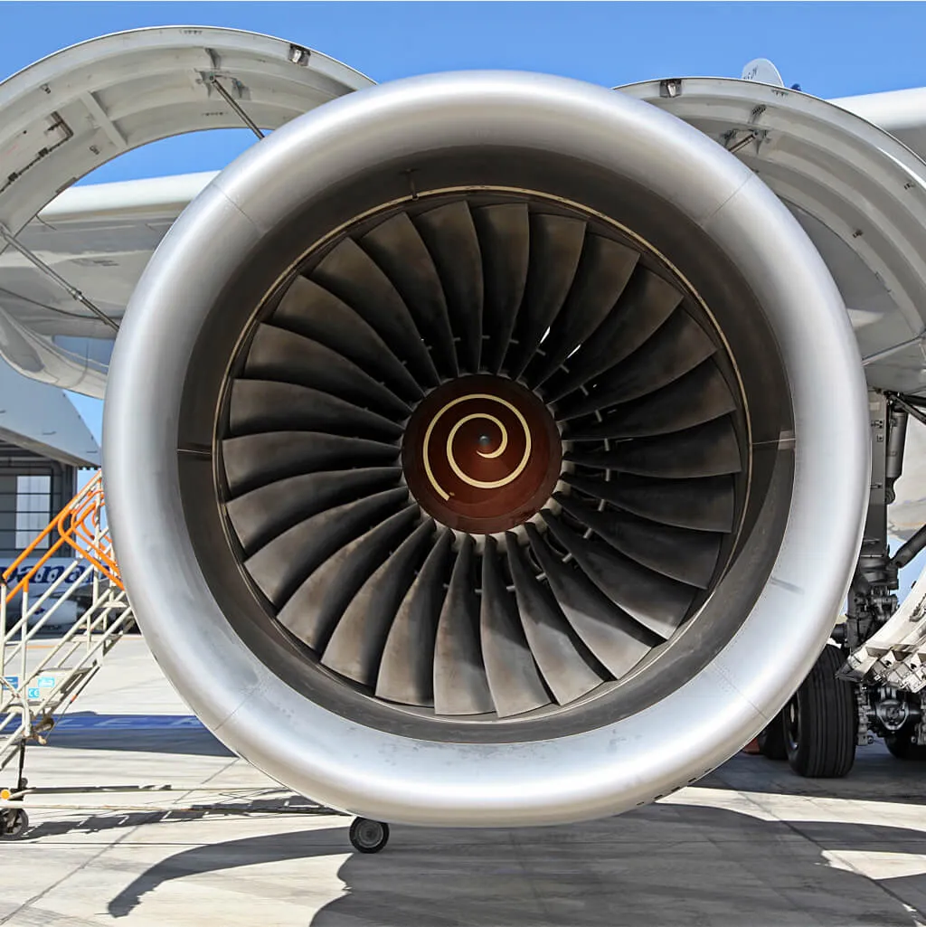 Turbofan engine on an aircraft wing, representing Shape's aerospace work