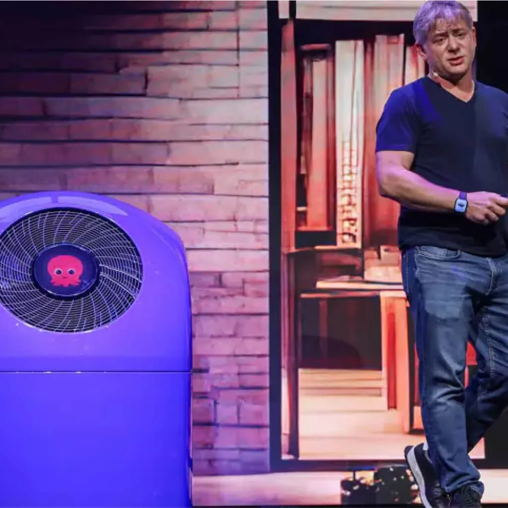 Octopus Energy heat pump shown on stage at a product launch