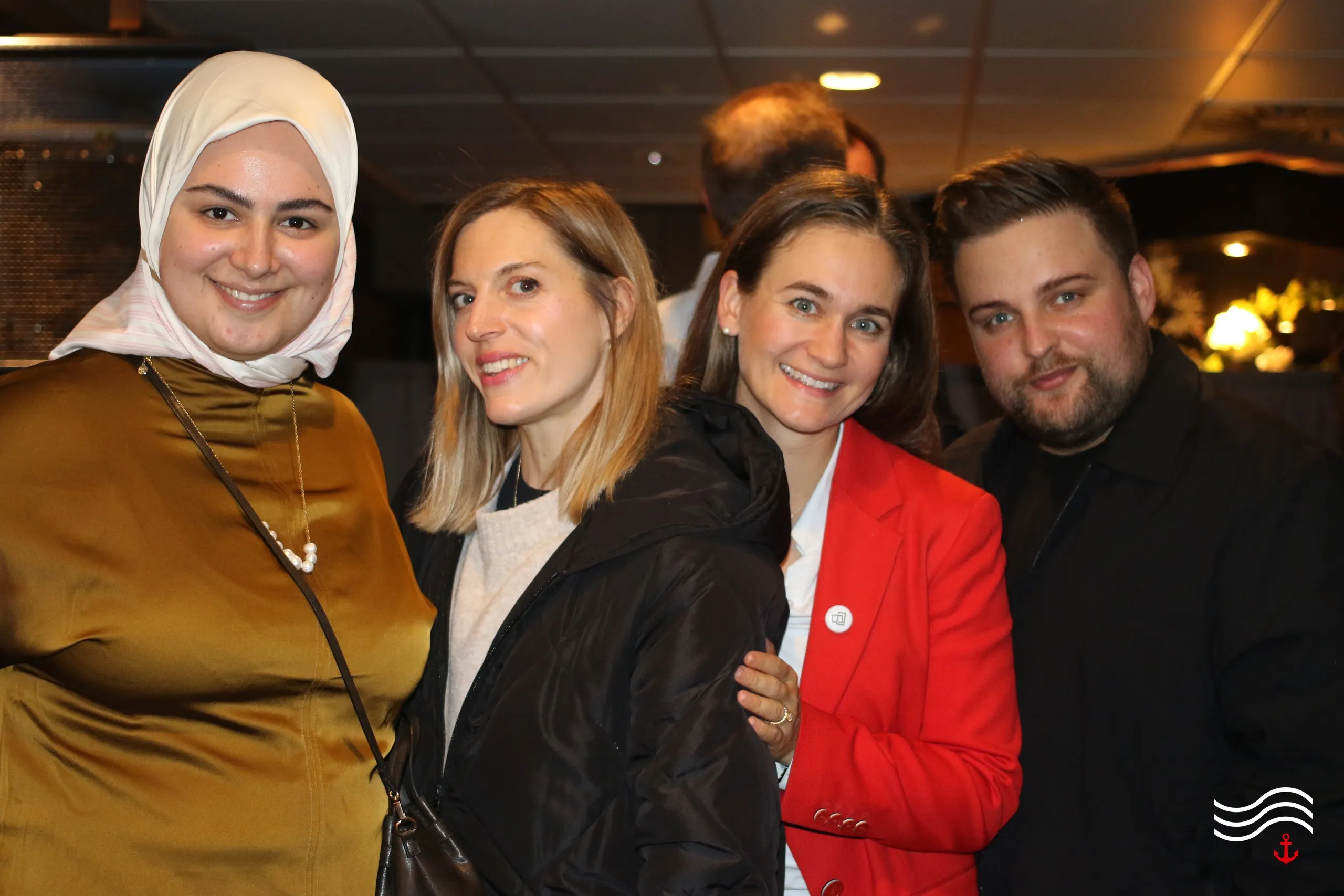 Gruppenfoto von vier Gästen bei der Party – brands & agencies THE UPPER DECK 2026 in Köln