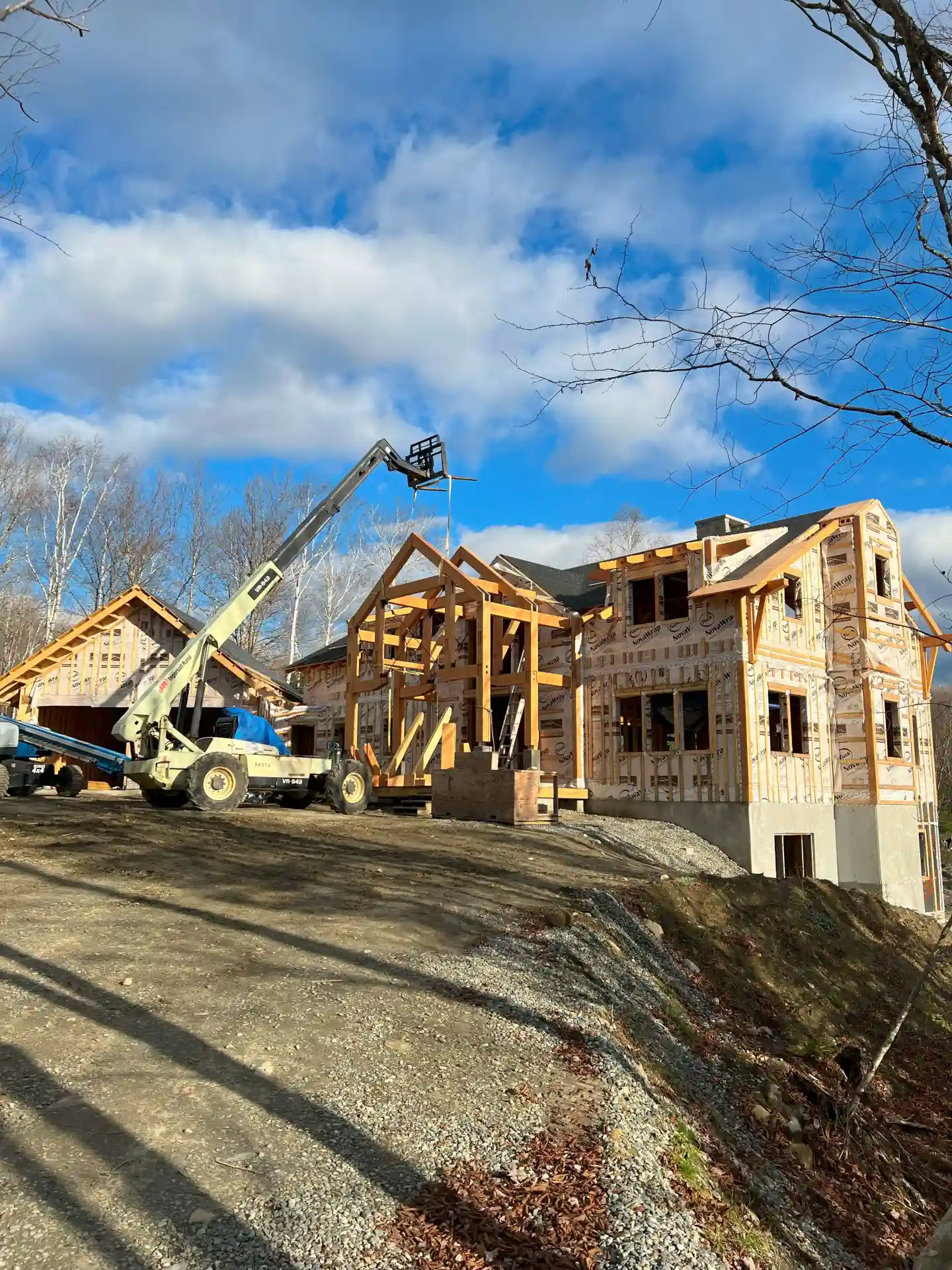 A custom timber frame enclosure kit being installed on site.