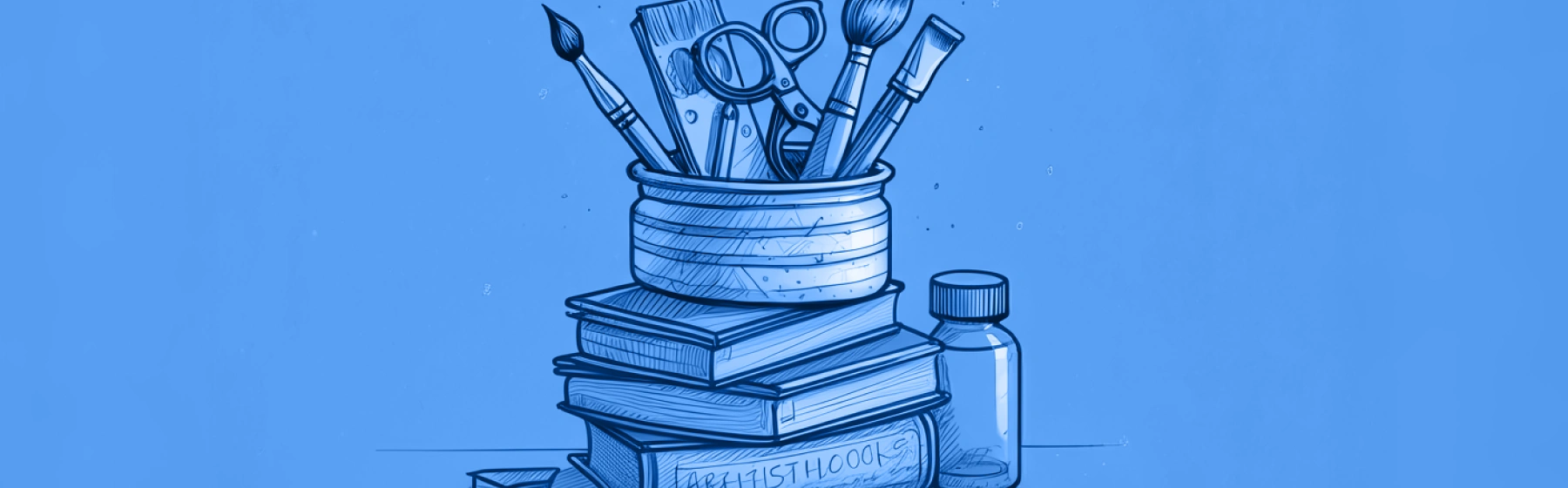 Brushes and pencils in a cup on top of books