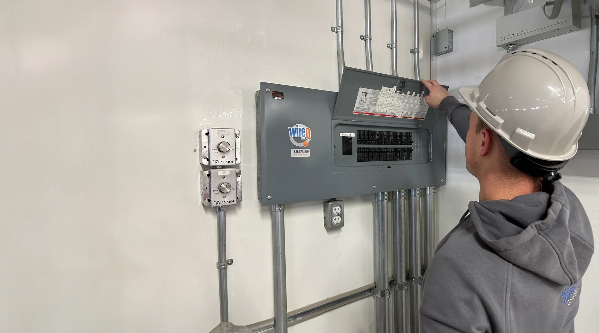 Clean, labeled commercial electrical panel installed by WireQ