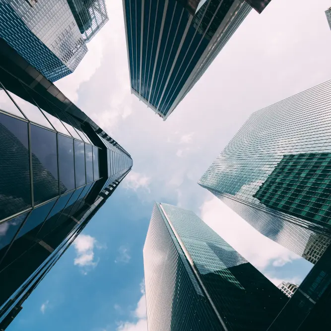 A view of the skyline of a city with tall buildings. - DAS Images