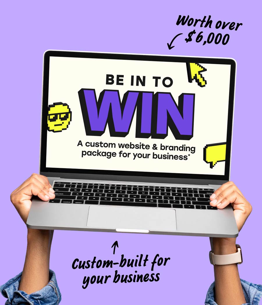 A laptop displaying a screen that says Be in to Win a custom website & branding package for your business