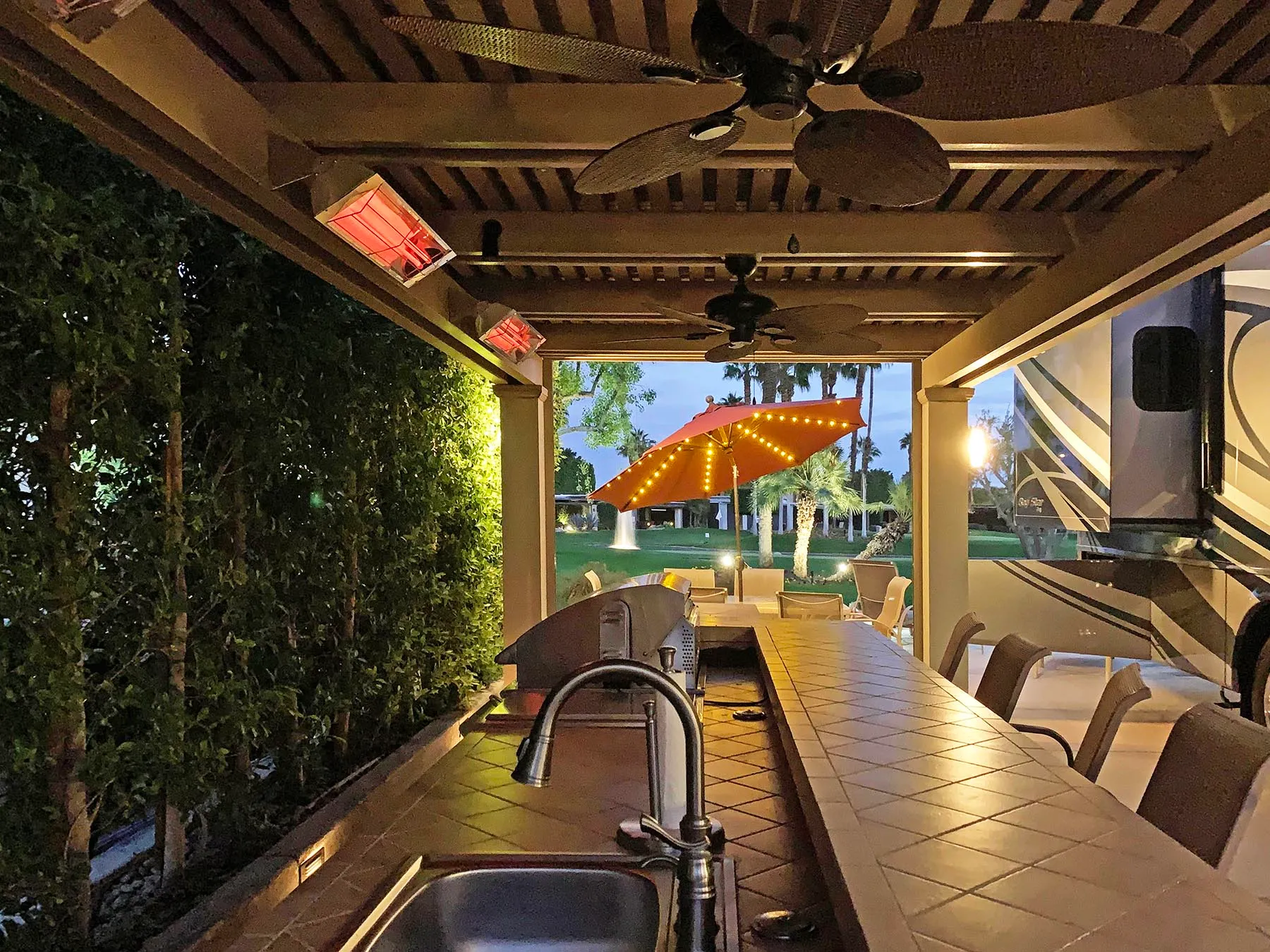 luxury RV lot pergola golf course view at night