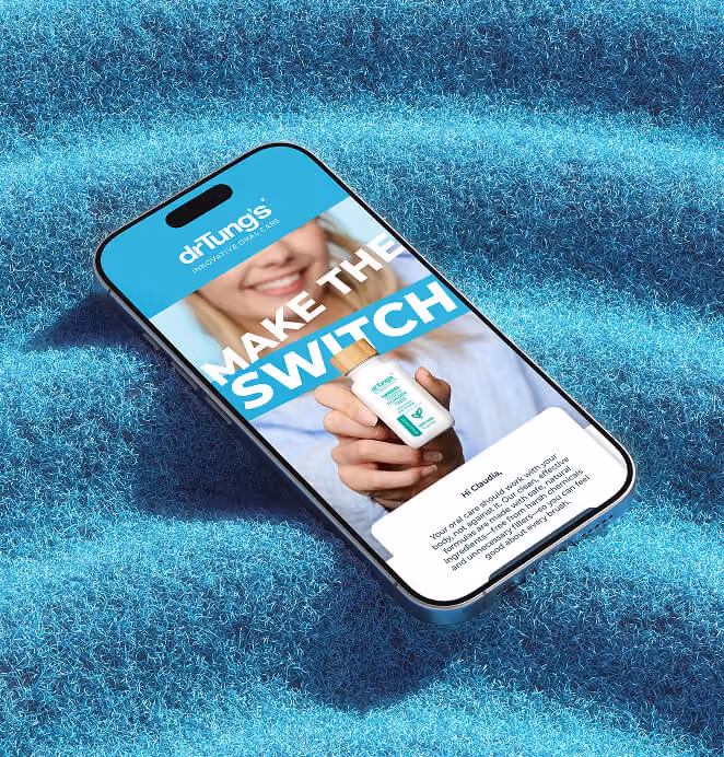 DrTung’s Make the Switch campaign displayed on a smartphone with herbal tooth powder tabs.