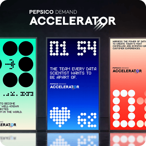 Colorful digital display panels showcasing PepsiCo Demand Accelerator branding with abstract data-inspired graphics and typography.