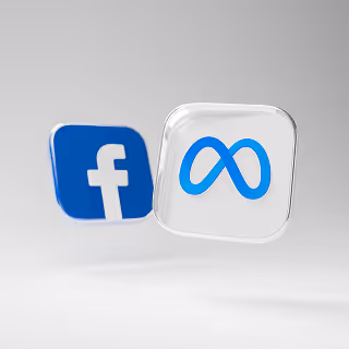 A clear, minimalistic rendering of the Facebook and Meta logos, floating side by side, representing rebranding and partnership dynamics between well-known companies.