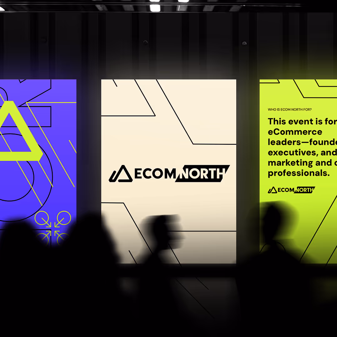 Bold event signage for ECOM North with geometric patterns in neon green, purple, and cream, highlighting its focus on eCommerce executives and professionals.