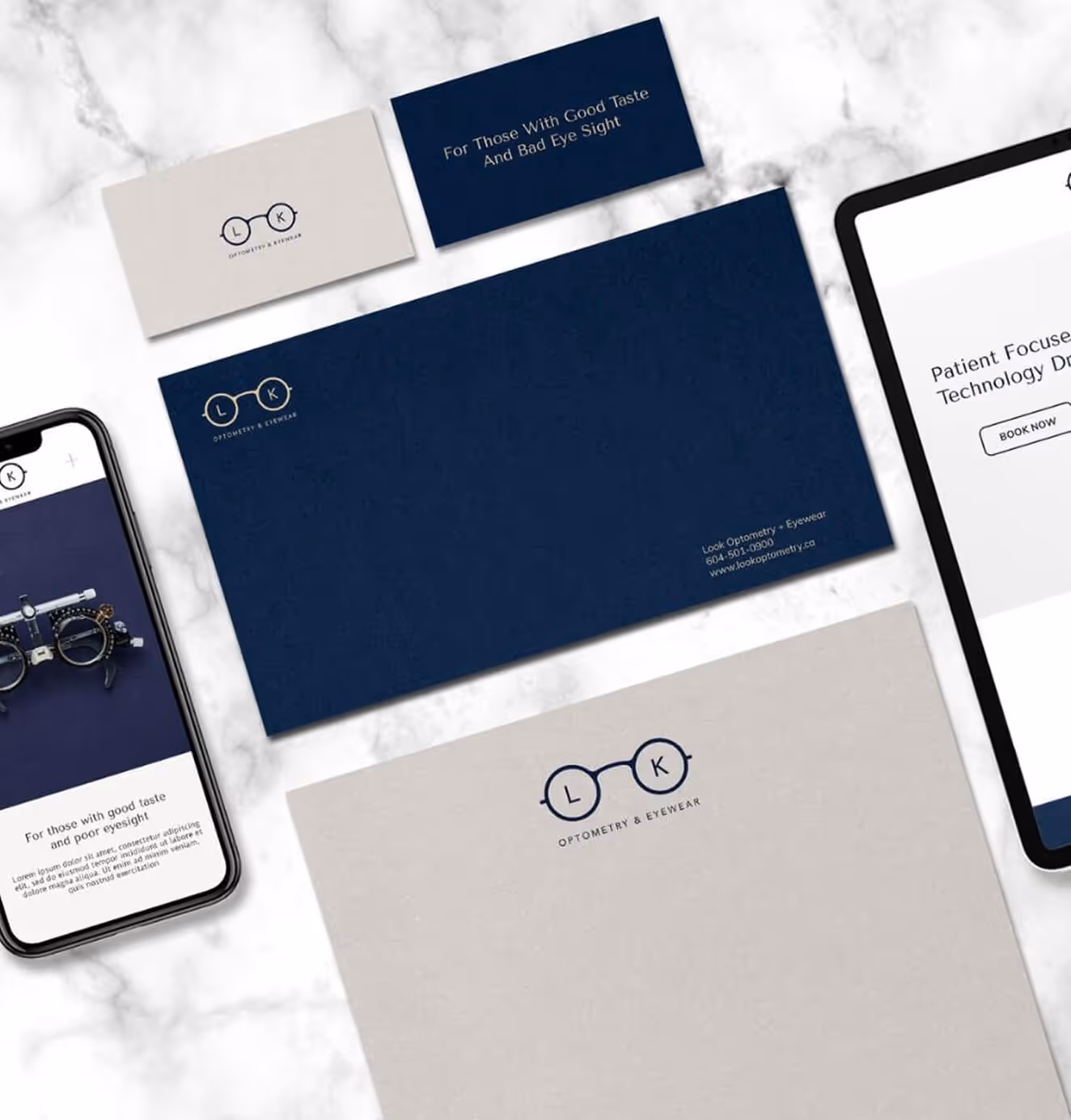 Brand identity system for Look Optometry, including business cards, envelopes, letterhead, and mobile and tablet screens with the logo and tagline.