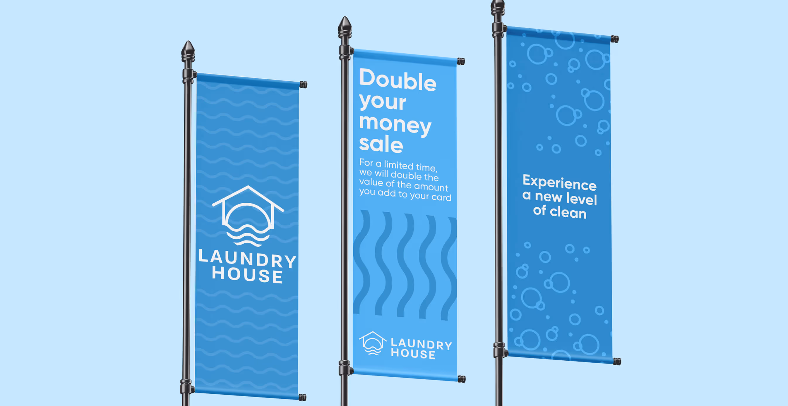 Laundry House promotional banners with blue branding, wave graphics, and messages like “Double your money sale” and “Experience a new level of clean.”