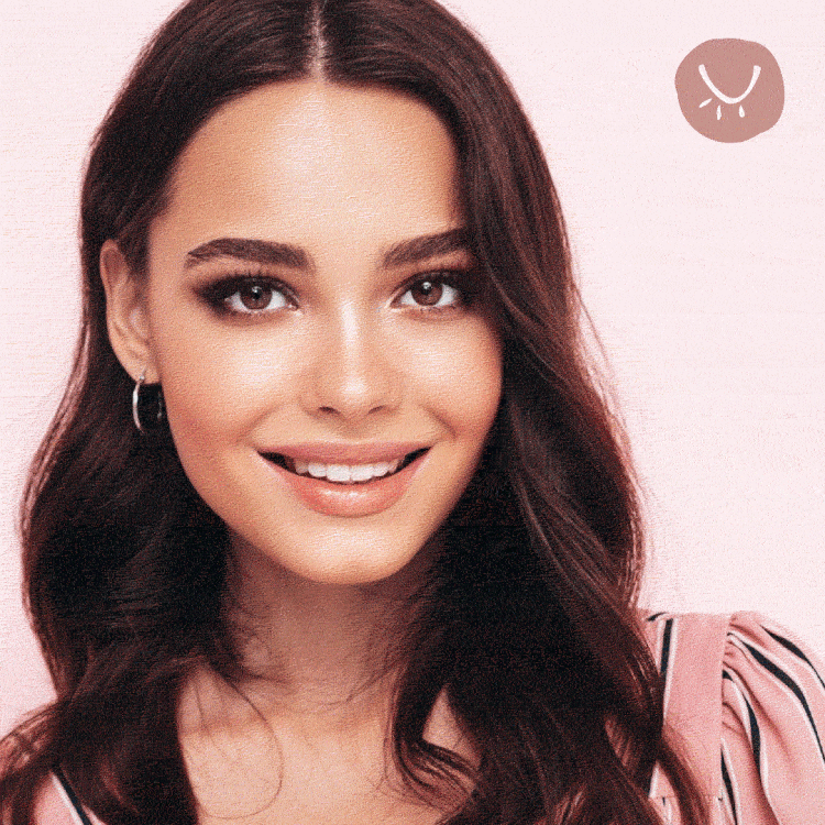 GIF of a woman smiling with long Pure Lashes, wearing minimal makeup and a striped pink outfit, with the Pure Lashes logo in the corner.