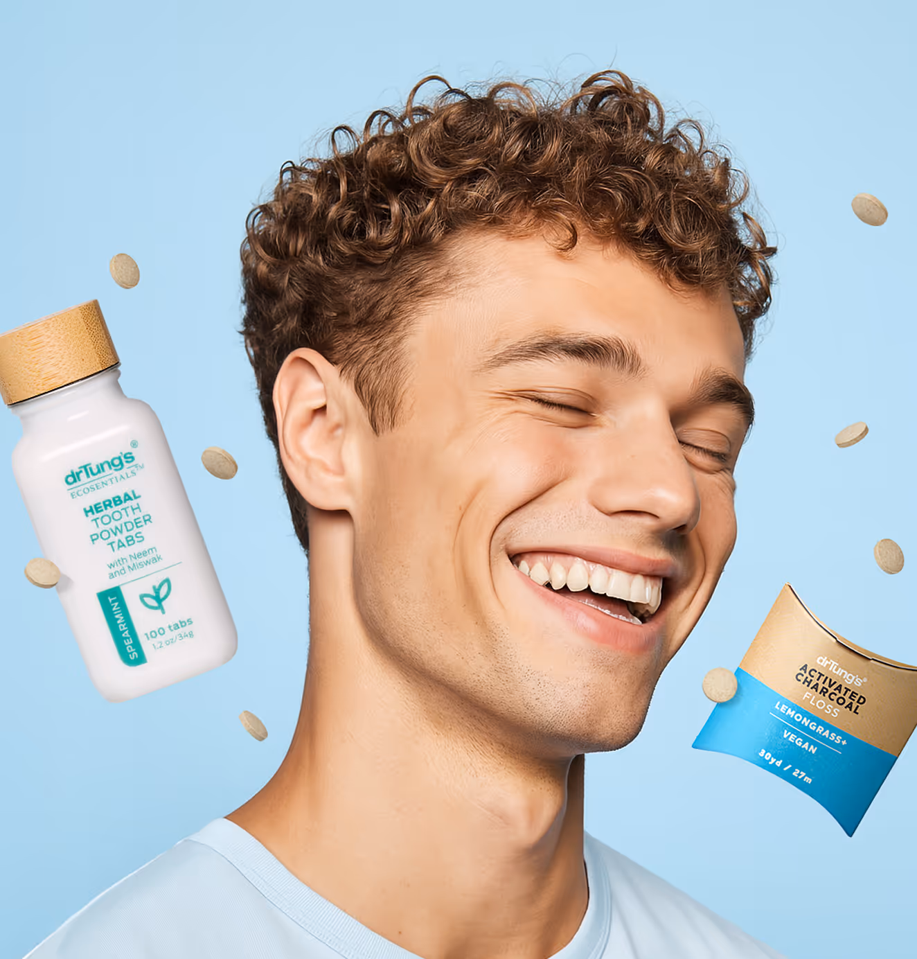 Outdoor advertisement for DrTung's stainless steel tongue cleaner, featuring a smiling woman using the product and a message encouraging healthier oral care habits through smarter product choices.