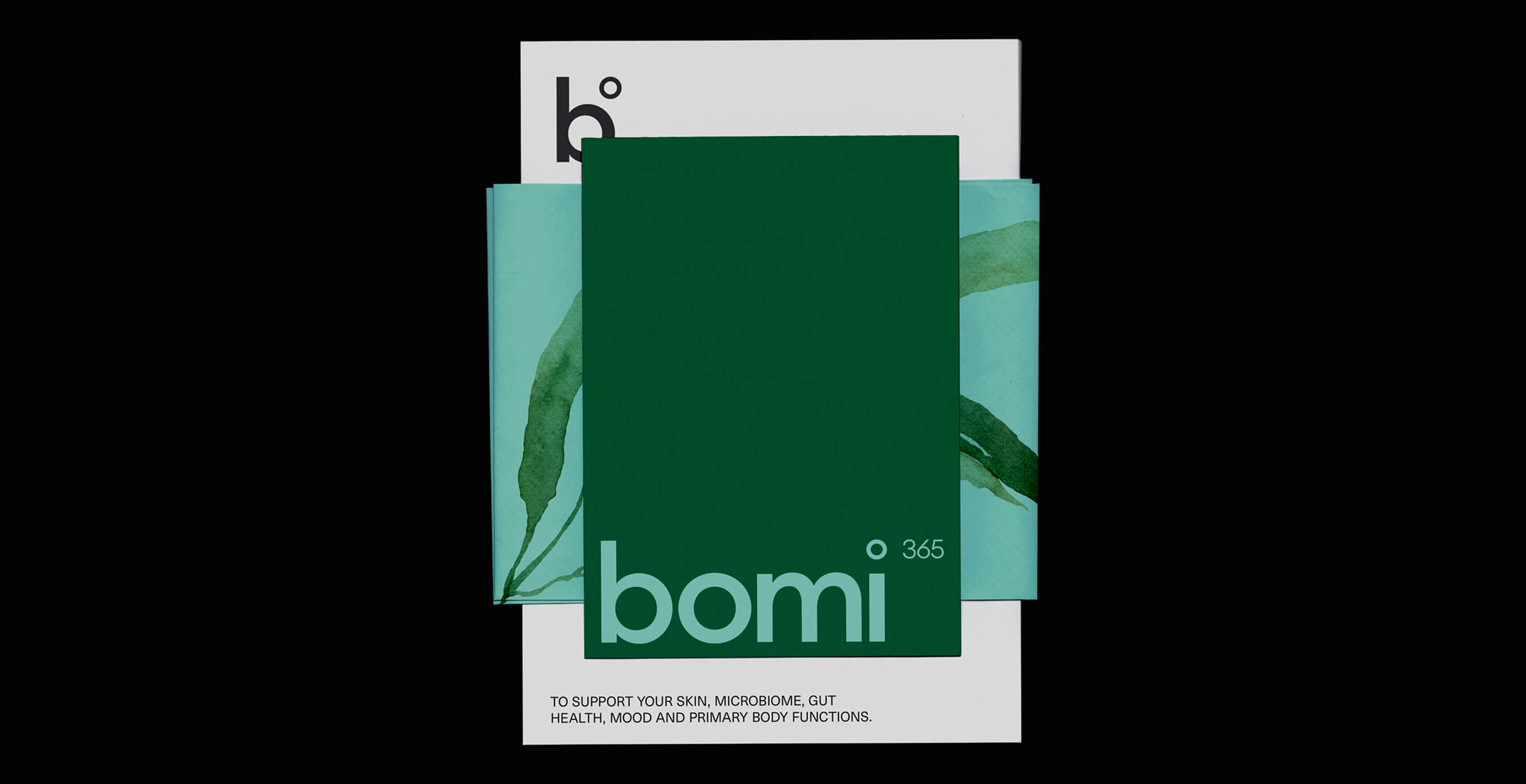 Bomi 365 packaging design in dark green and teal with leaf illustrations, highlighting the product’s natural health benefits.