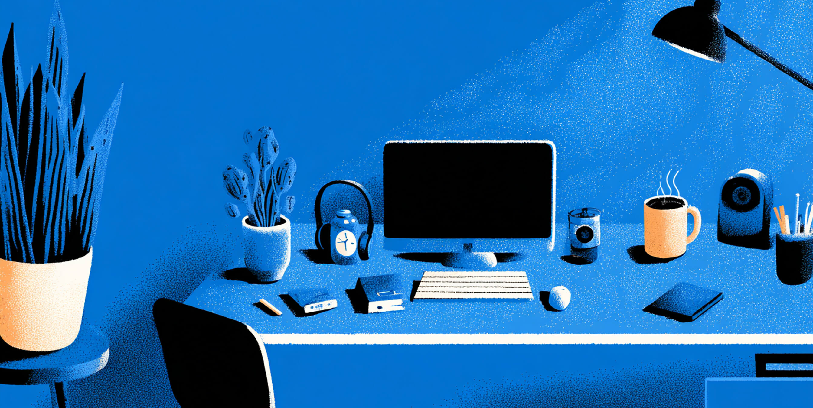 Organized modern workspace with plants, coffee, and a computer under soft lighting, representing productivity and creative focus.