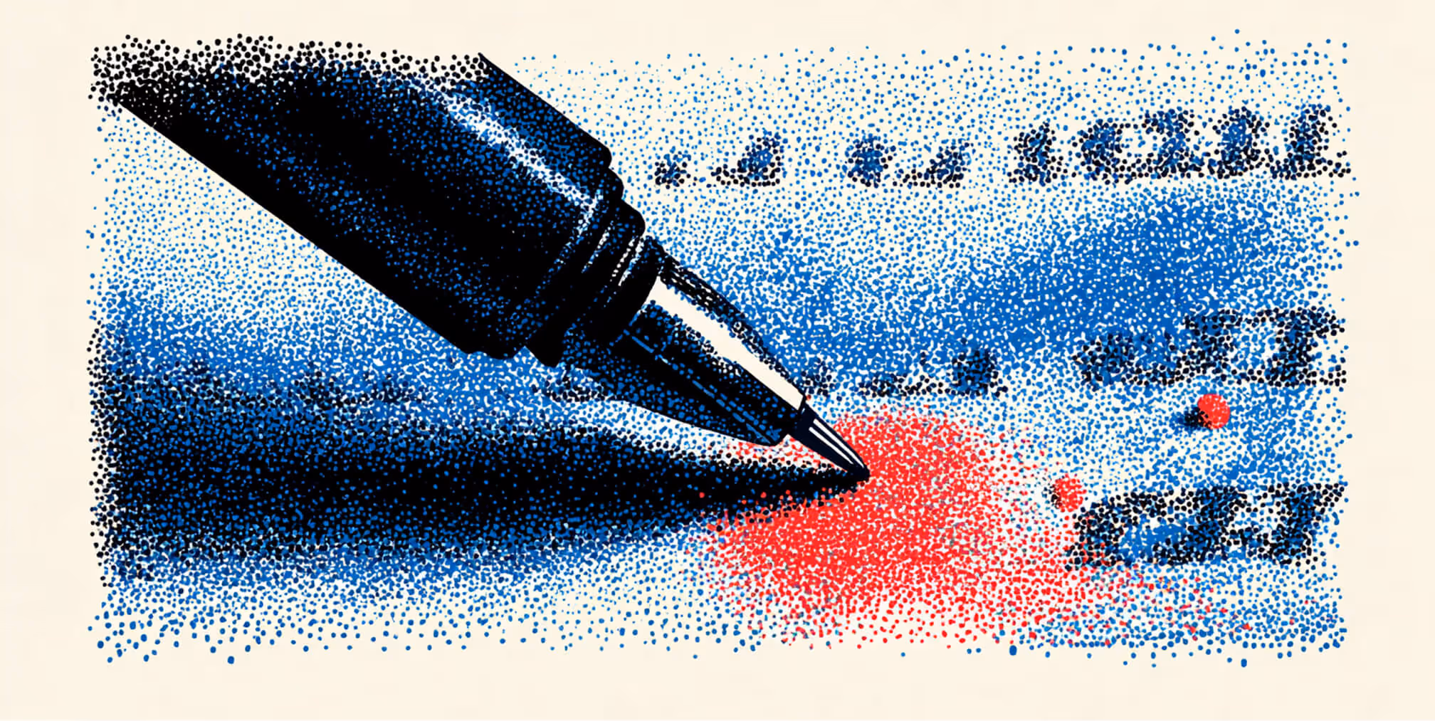 Close-up of a pen tip writing across a surface with red and blue ink textures, symbolizing attention to detail and storytelling.