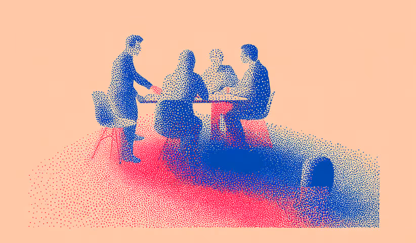 Group of people gathered at a table in discussion, symbolizing collaboration, teamwork, and community-driven growth.