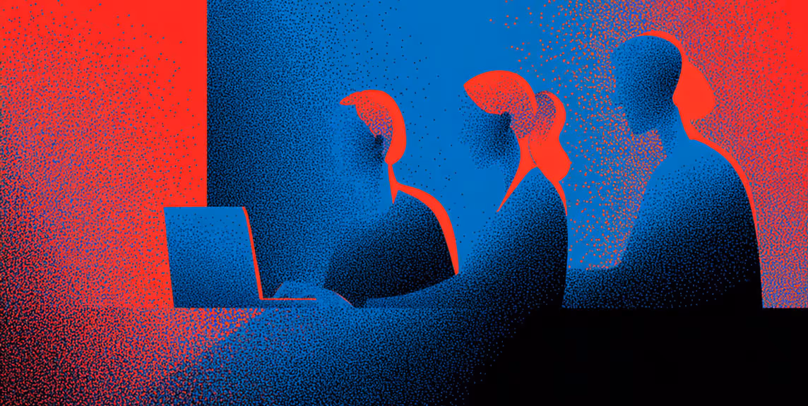 Three abstract figures illuminated in blue and red light working at a laptop, symbolizing teamwork, collaboration, and shared creative focus.