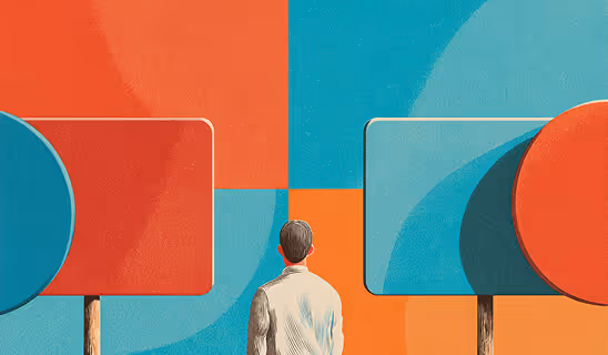 A man standing between two large colorful signage panels, looking ahead at a red-and-teal geometric wall.