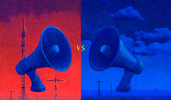 Two large megaphones facing forward, one on a red background and one on a blue background, with “VS” in the center.