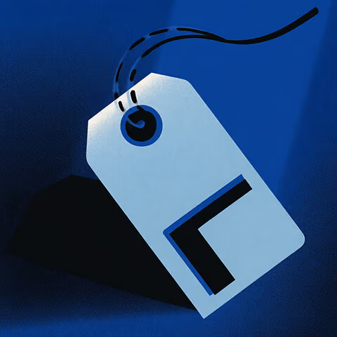 Blue price tag illustration with a minimalist cut-out design, representing website pricing or cost considerations.