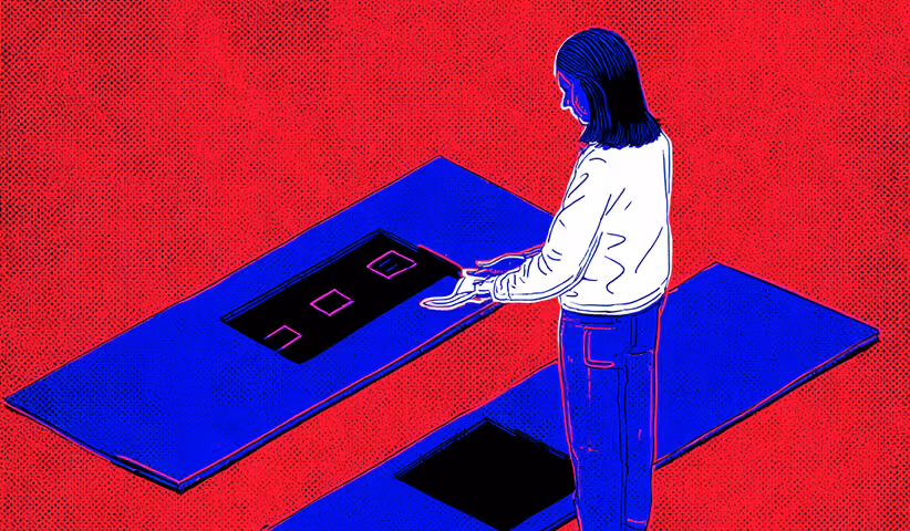 A person examining blue panels with product mockups, reflecting user experience testing during a redesign.