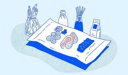 Flat-lay illustration of food ingredients arranged on paper, including bread, vegetables, bottles, and packaging.