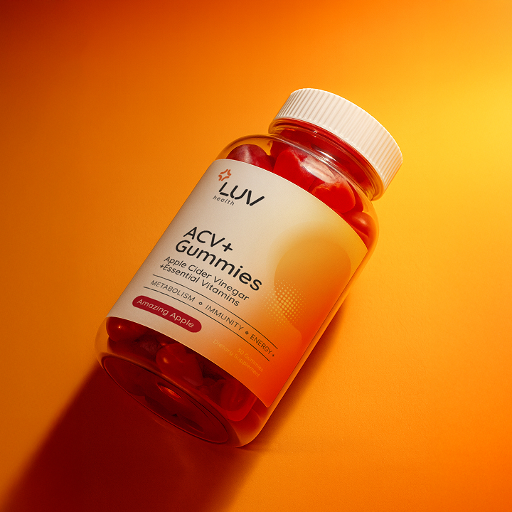 Bright orange LUV Health ACV+ Gummies bottle mockup on a vibrant gradient background, showcasing modern supplement branding design.