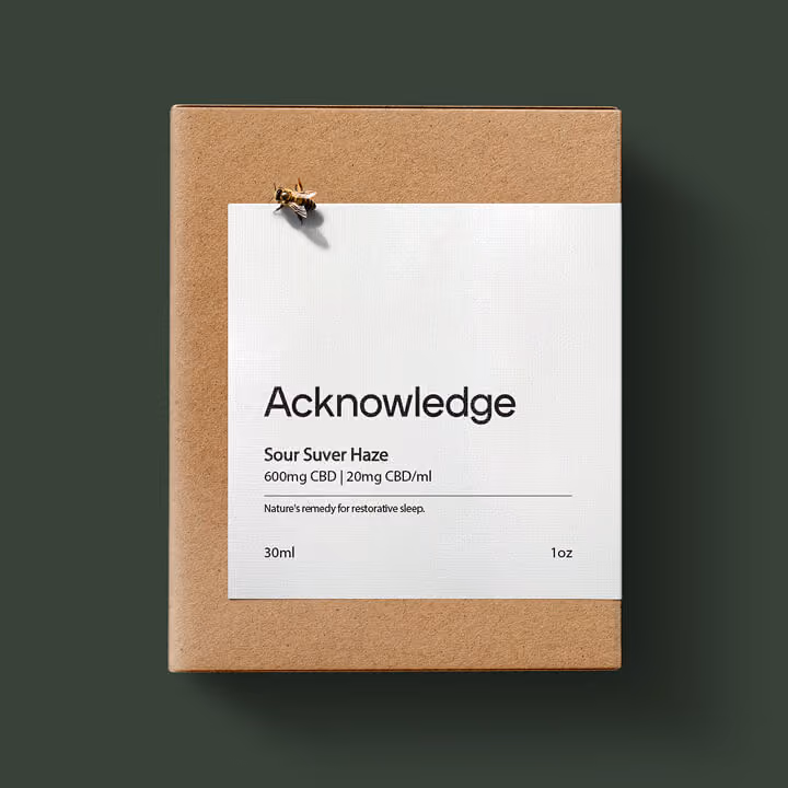 Minimalist Acknowledge CBD product packaging with clean typography and modern wellness branding design.