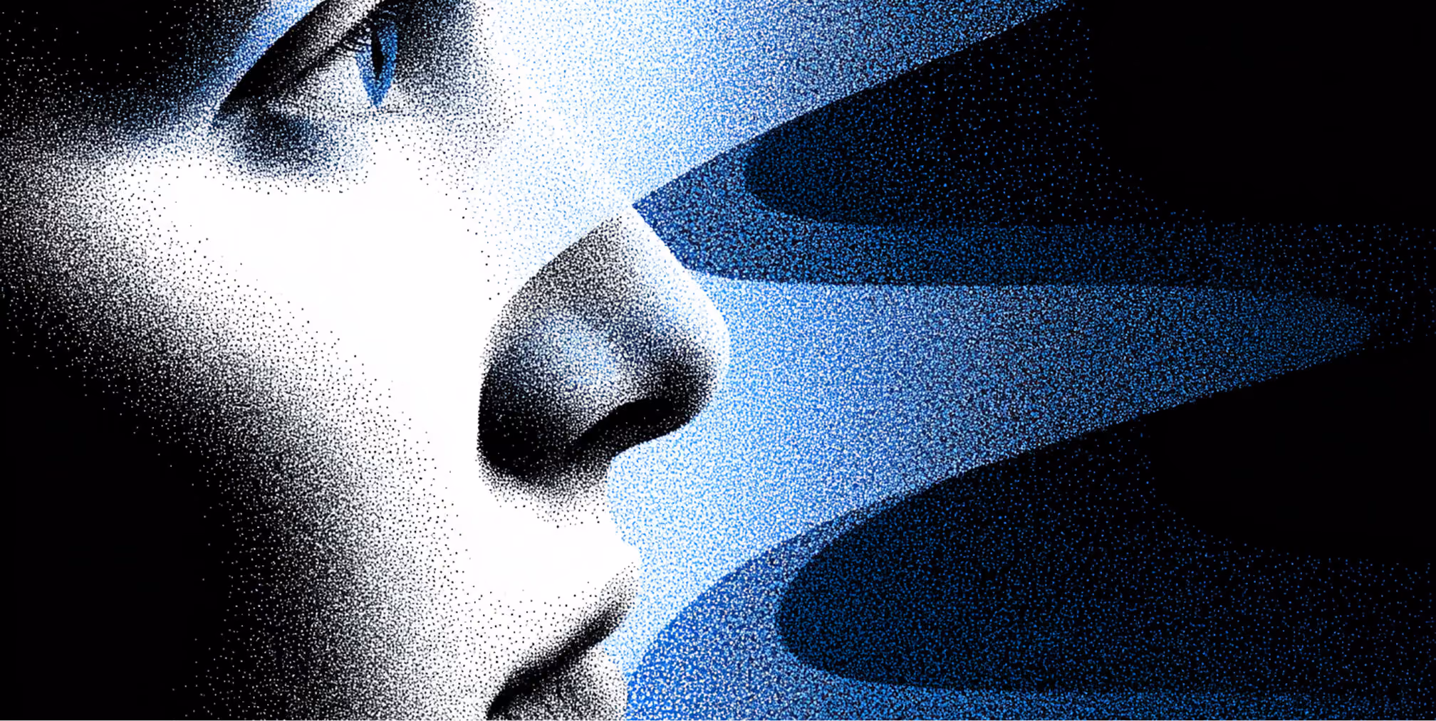 Close-up of a human face with light projecting outward from the eye, symbolizing insight, vision, and AI-driven perception.