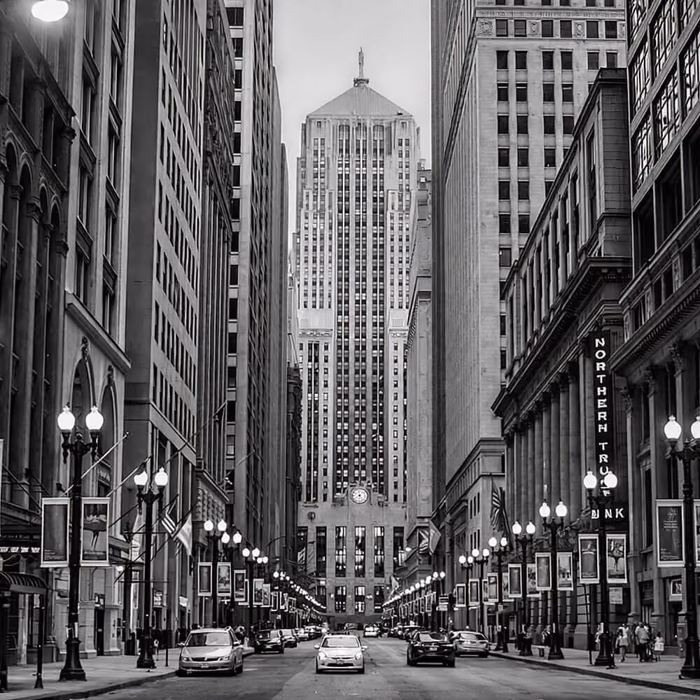 Downtown Chicago street view featuring classic skyscrapers and the Chicago Board of Trade Building.