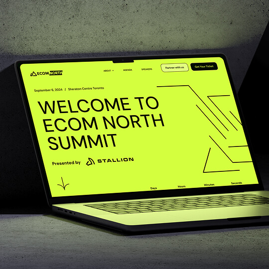 Laptop displaying a modern marketing event landing page for Ecom North Summit with bold design.