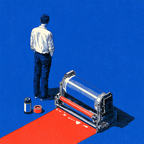 Person standing beside a printing press producing a bold red sheet, symbolizing the creation and rollout of a new brand identity.