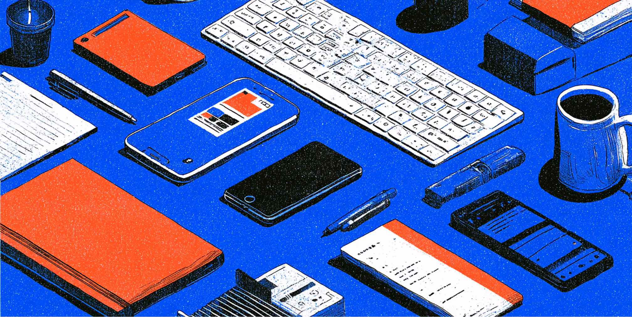 Workspace with keyboard, phone, notebooks, and tools, representing everyday brand assets, consistency, and multi-channel execution.