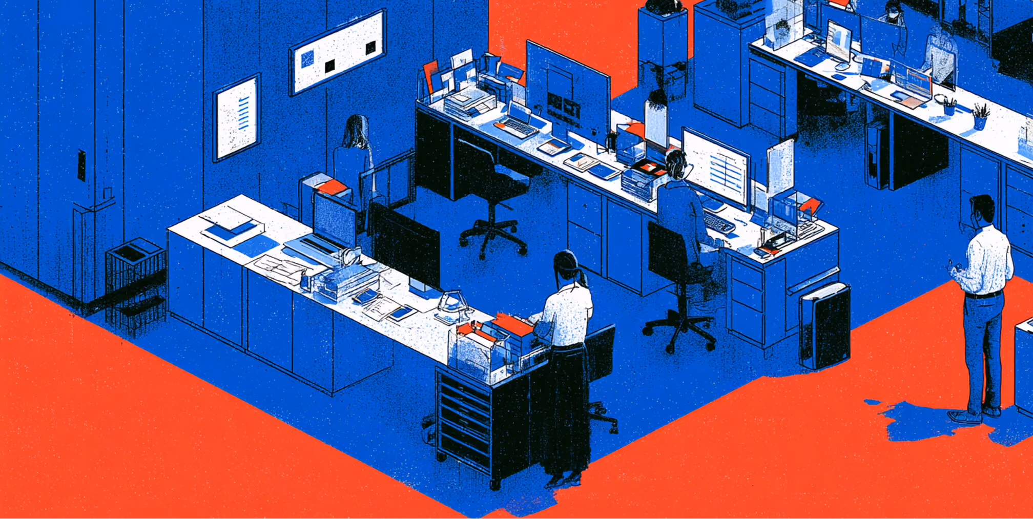 Office environment with team members working across desks and computers, representing collaboration, operations, and scaling brand systems.