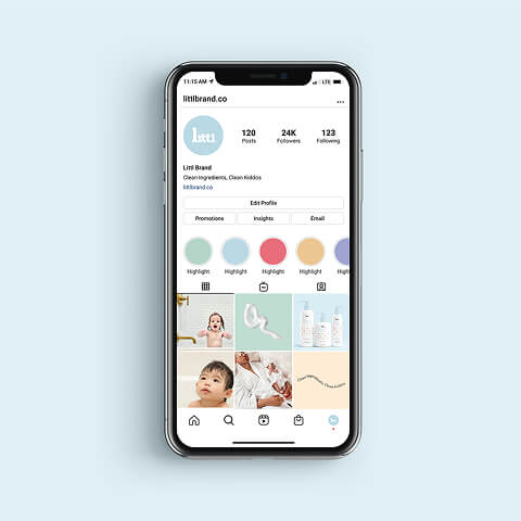 Smartphone displaying a social media profile page with posts, highlights, and follower metrics, representing account management and content strategy.