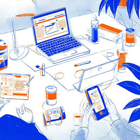 Multiple devices on a desk showing digital content, representing cross-platform content consumption and brand visibility.