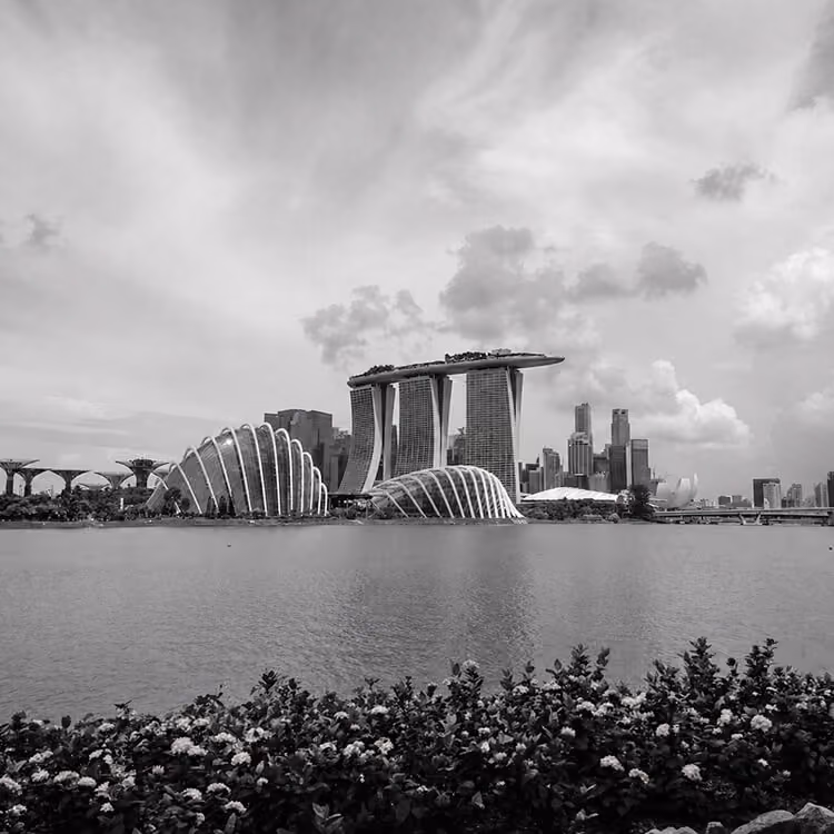 Marina Bay Sands and Gardens by the Bay viewed across the water in Singapore.