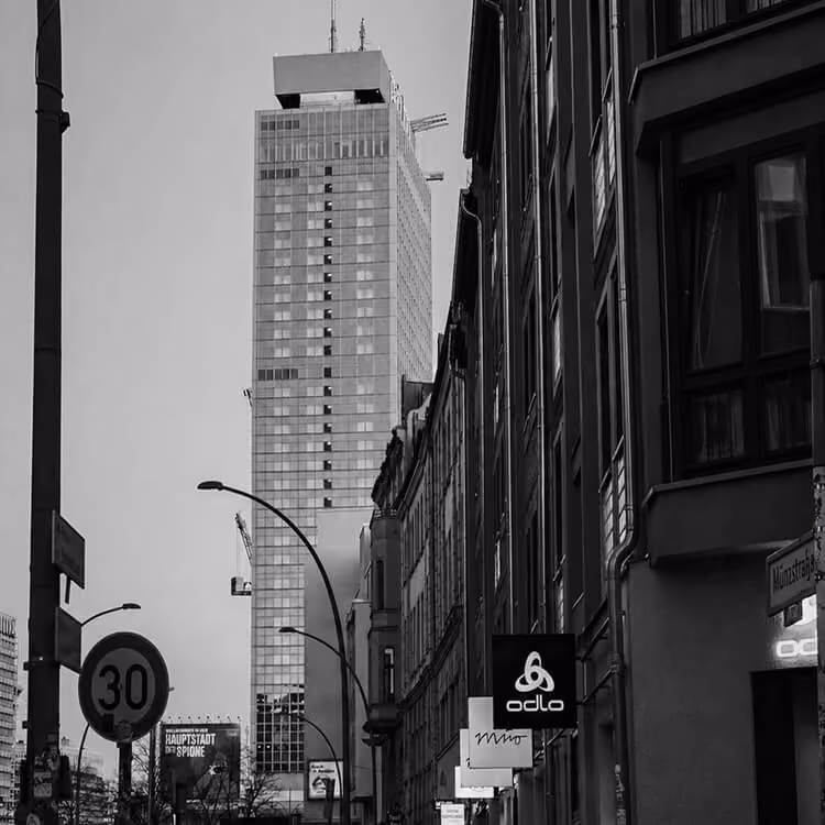 Urban Berlin street view with high-rise buildings and contemporary city development.