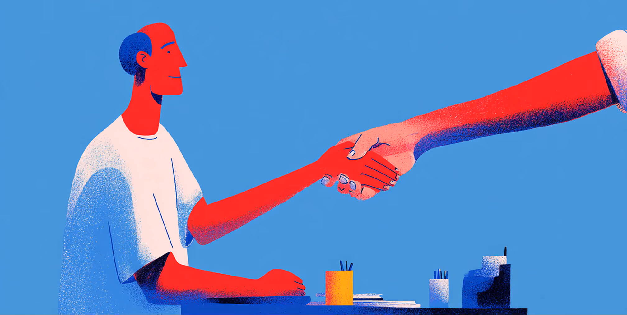 Two individuals shaking hands across a desk, representing partnerships, collaboration, and client relationships.