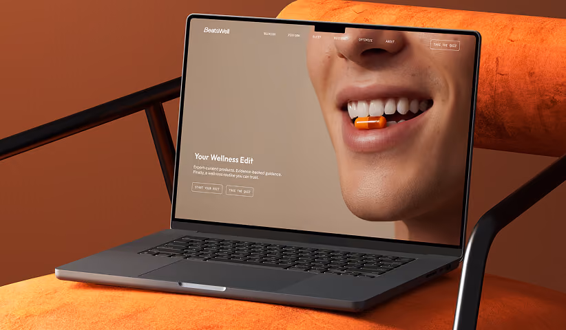 Laptop displaying a branded website with product imagery, representing digital brand experience and web design.